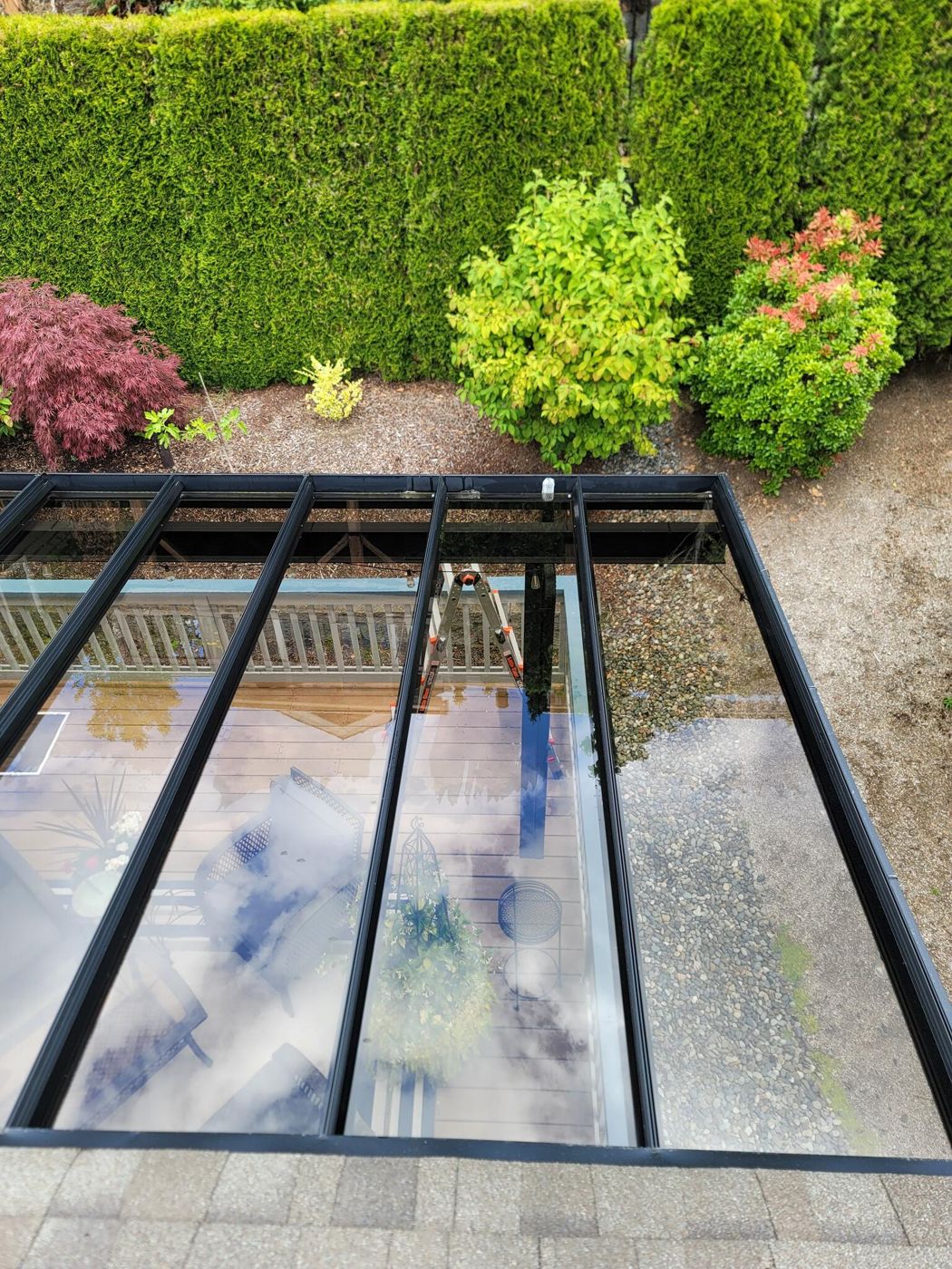 Dirty glass patio cover, before